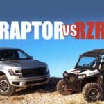 a raptor and rzr side by side in the desert