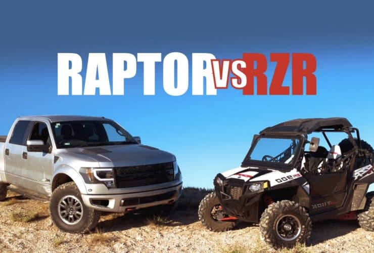 a raptor and rzr side by side in the desert