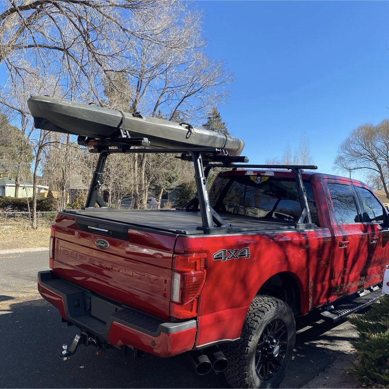 Kayak on ford truck with cover
